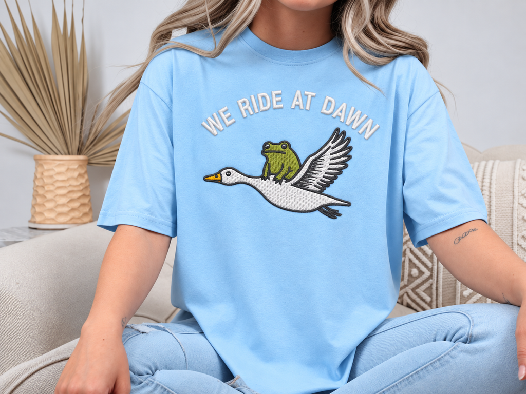 We Ride at Dawn Frog & Goose Embroidered Shirt | Funny Animal Gildan Tee | Custom Shirt Color