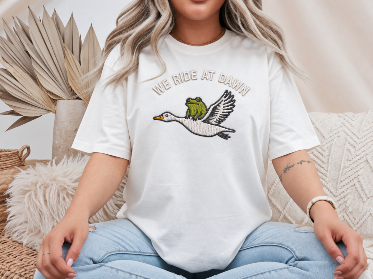 We Ride at Dawn Frog & Goose Embroidered Shirt | Funny Animal Gildan Tee | Custom Shirt Color